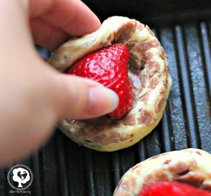 cinnamon roll covered strawberries